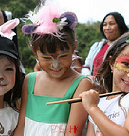 Three girl at corporate funfair in HK got a lovely face paint form a face painter.