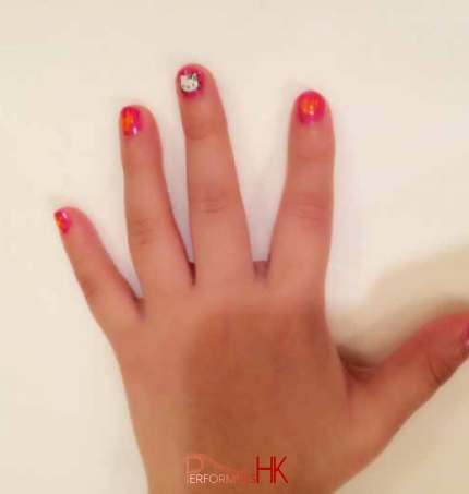 A girl is Hong Kong got her nails done at a corporate event .