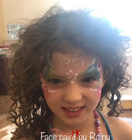 Princess face painting on child