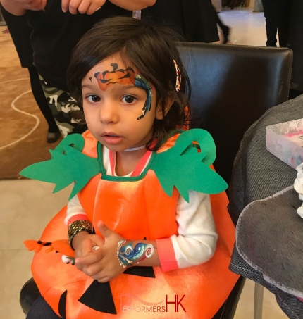 Pumpkin face painting and hand painting 