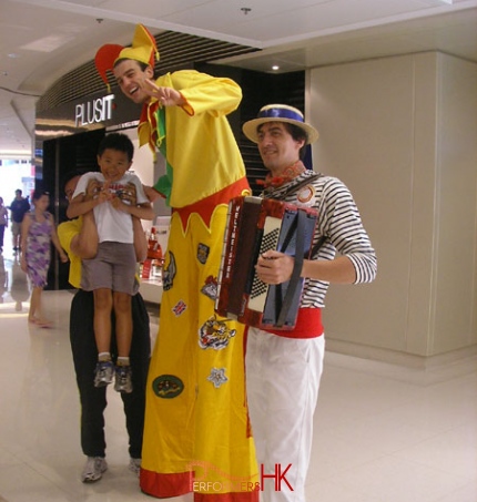 Hong Kong professional stile walker in a Patch Jester costume meet and greet the visitor at a shopping mall event