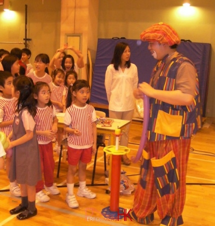 Joke making balloons for kids at a school in Hong Kong