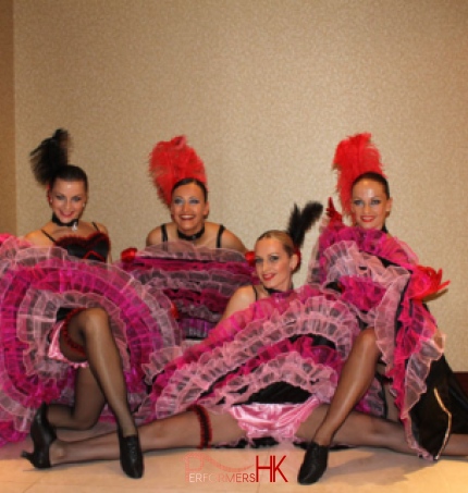 4 dancers posing in the hallway just before performance