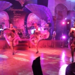 Can can dancers doing their famous high kicks at AMC year end ball.