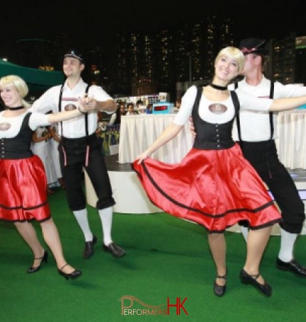 Two pair of dancers doing Bavarian dance at Hong Kong Jockey Club Oktoberfest event