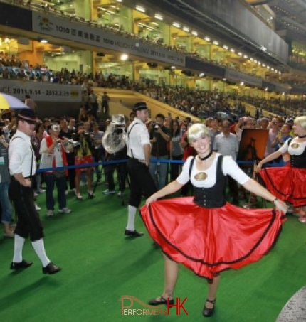 Four German dance dancers and a big crowd of audience at Hong Kong Jockey Club Happy Valley