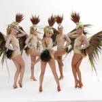 Beautiful and Elegant dancers dressing their feather costumes.