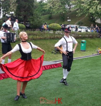 Bavarian dance performance at a park in Hong Kong with two dancers