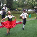 Bavarian Dance dancers showing people at a park their elegant moves. 