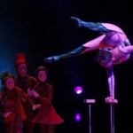 Handbalancing performer showing off her amazing skills. 