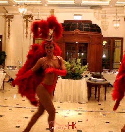 Three Vegas Showgirl dancers in Hong Kong dancing in a corporate annual diner party