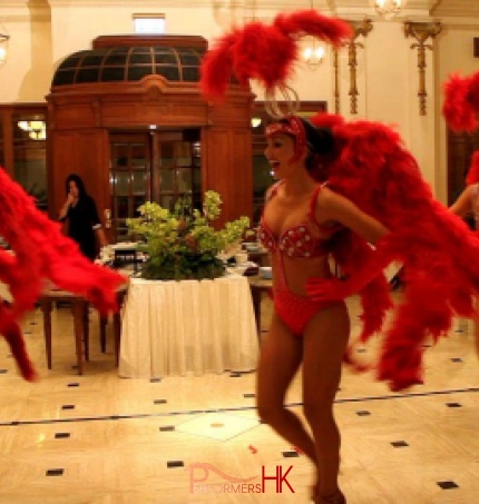 3 dancers performing in vegas show girl costume