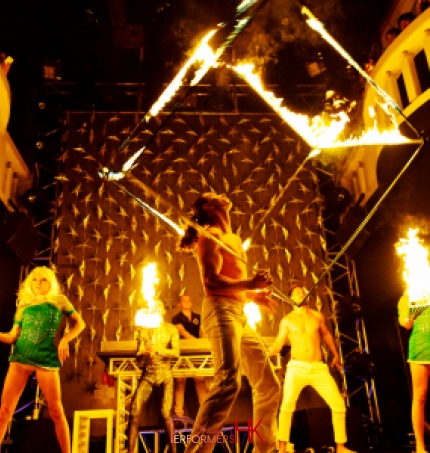 Hong Kong Five talented fire performer  performing with fire staff and fire cube at a corporate event  