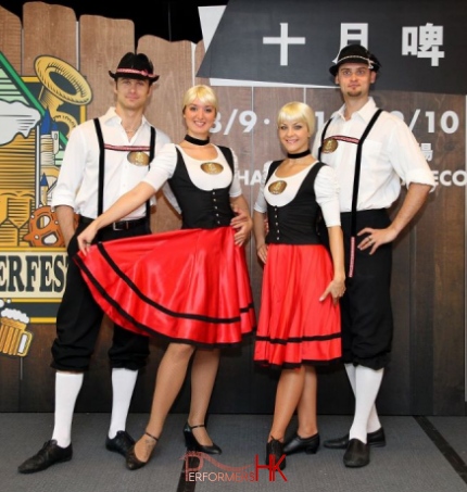 Four German dancers posing for the Hong Kong Jockey Club Oktoberfest press confession event