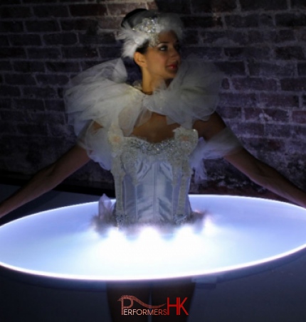 girl in white corset in LED costume canape dress