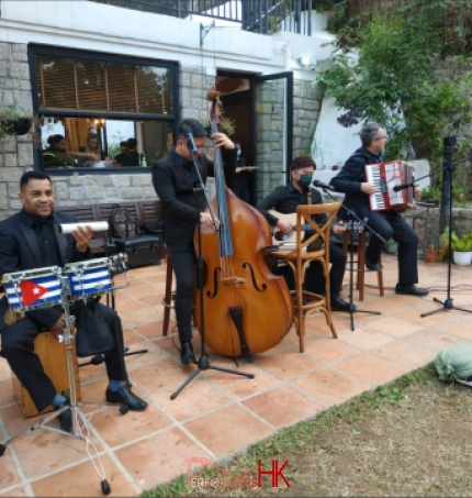 4 musicians in repluse bay Hong Kong, double bass, percussion, accordion, guitar combo