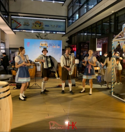 Full costume Oompah band, Hong Kong, with beer girls, Central market Hong Kong, 2023