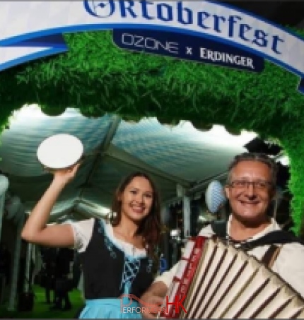 Solo accordion player with beer girl at event for Ritz Carlton hotel