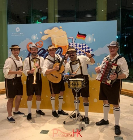 laderhousen wearing german oktoberfest band playing music for Tuen Mum Gold coast event