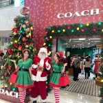 Santa Martin with his elf girl promoters for Coach HK in Causeway Bay