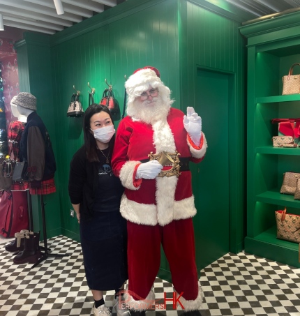 Santa in red costume in fashion shop in sogo hong kong store