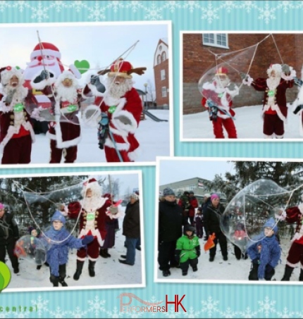 Santa Mario chinese santa from hong kong playing giant bubbles with kids in finland