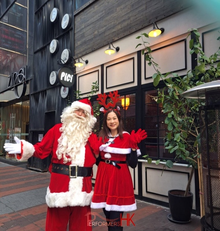 Santa and Santa girl in restuarant 