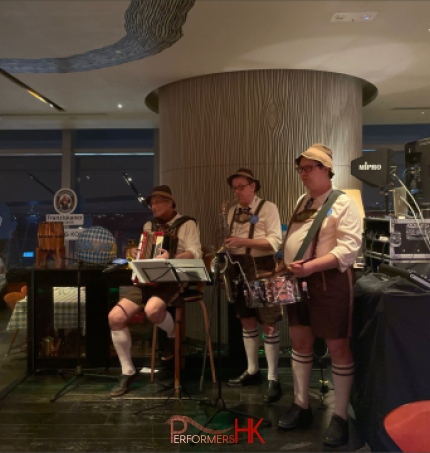 3 peice Oktoberfest band playing at event in W hotel hk