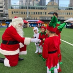 Santa Gerald chatting with mini elves and snowman kids at Hong Kong Football club, Dec 2023