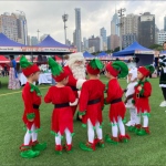 Santa Gerald greeting kids in costume at HKFC, Causeway Bay Hong Kong, Sports rd, with kids