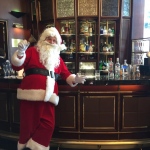 Santa Gerald at Island Shangri La bar greeting guests Dec 2023