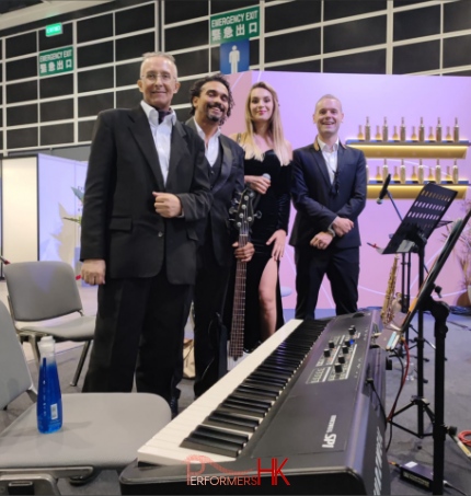 performers in black suit at Hong Kong trade development council event in Hong Kong