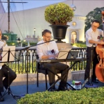 performance at tst hong kong 1881 luxury shopping mall with performance booked by performers hk musciains are wearing white shirt and black pants